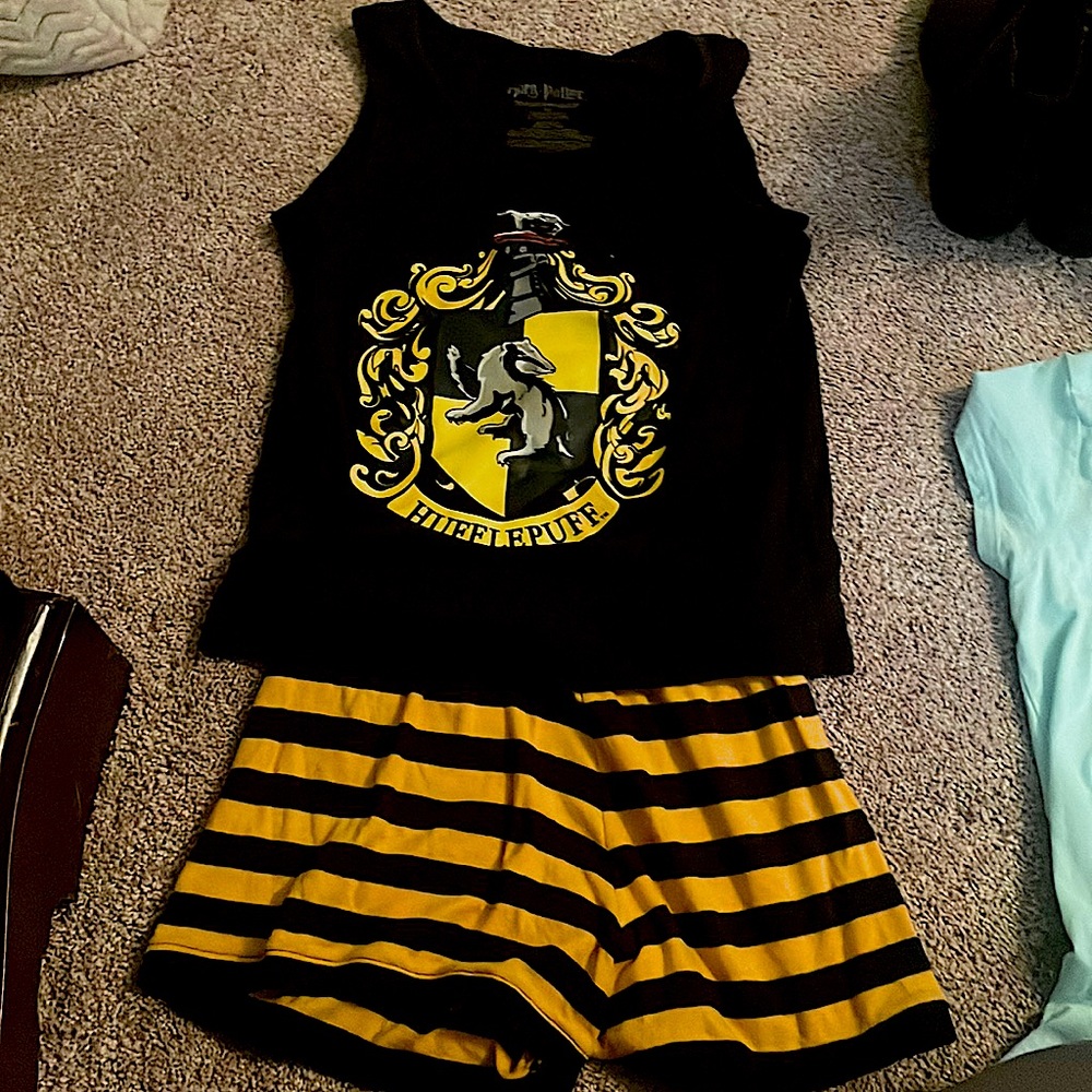 I am selling these Hufflepuff pajamas for kids 7-8 usually for girls.